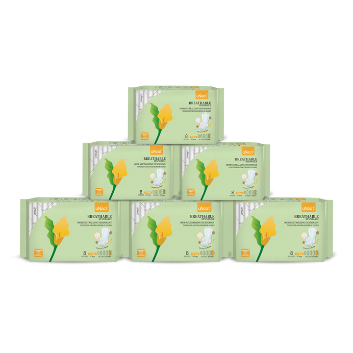 Six green packages of uNeat Breathable Sanitary Pads with Odor Neutralizing Technology (6-pack sale - check Website for details). Ultra thin, 8 count, and come in a 2X Long size (16.73 in / 425 mm). The green packaging features a green leaf logo with a yellow flower (uNeat flower logo).